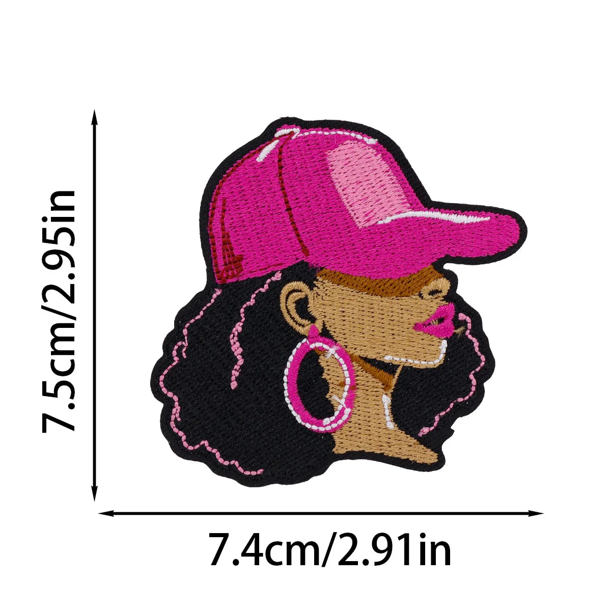 A pink baseball cap embroidered patch featuring a brown face and black curly hair.