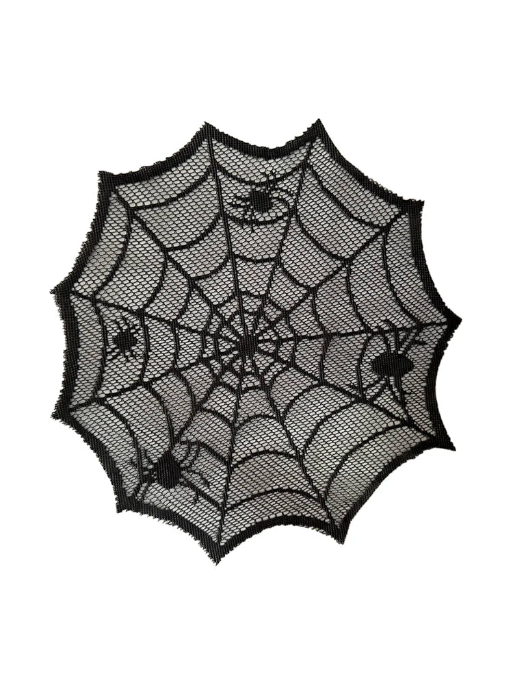 Black lace spider web design on a disposable table runner placemat