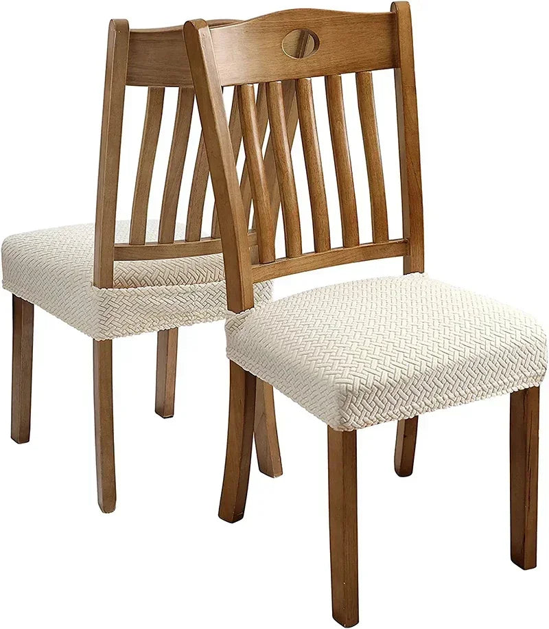 A wooden dining chair with vertical slats and a light beige removable seat cover.