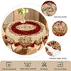 Elegant floral tablecloth with a vintage rose print displayed on a round table.