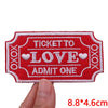 Red embroidered ticket patch with the text to love admit one