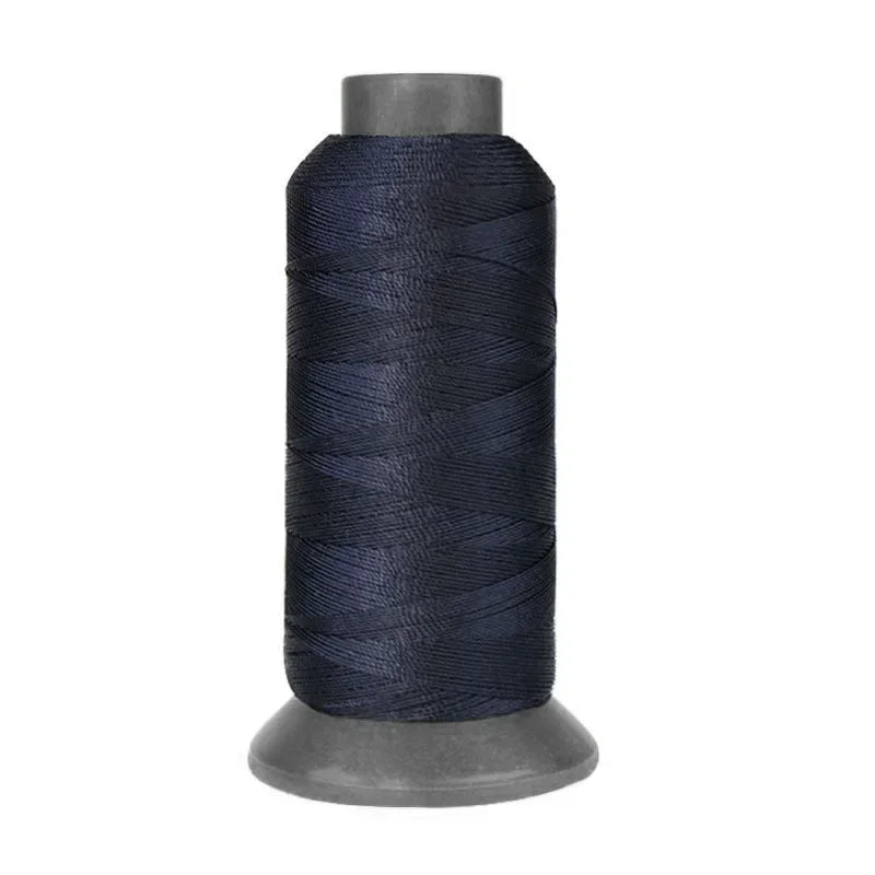 A roll of heavy duty 3-ply nylon sewing thread with a dark blue color.