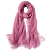 A sheer, flowing pink chiffon scarf draped elegantly.