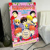 Poster for Ouran High School Host Club featuring anime characters in vibrant pink and yellow tones
