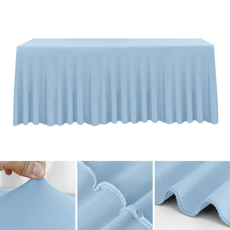 Light blue stretchable waterproof rectangle tablecloth draped over a table.
