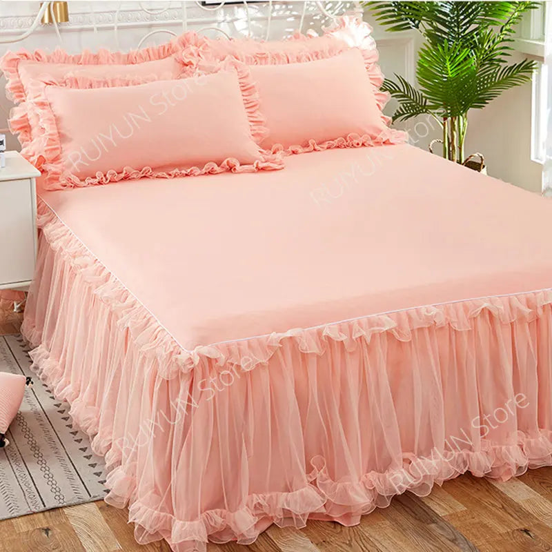Pink princess lace bed skirt set with a light pink duvet and pillows