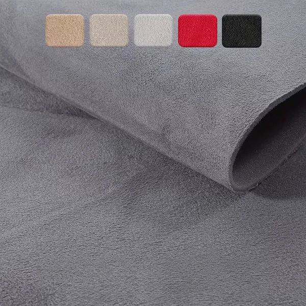 A swatch of gray suede fabric with a color palette showing beige, off-white, light gray, red, and black.