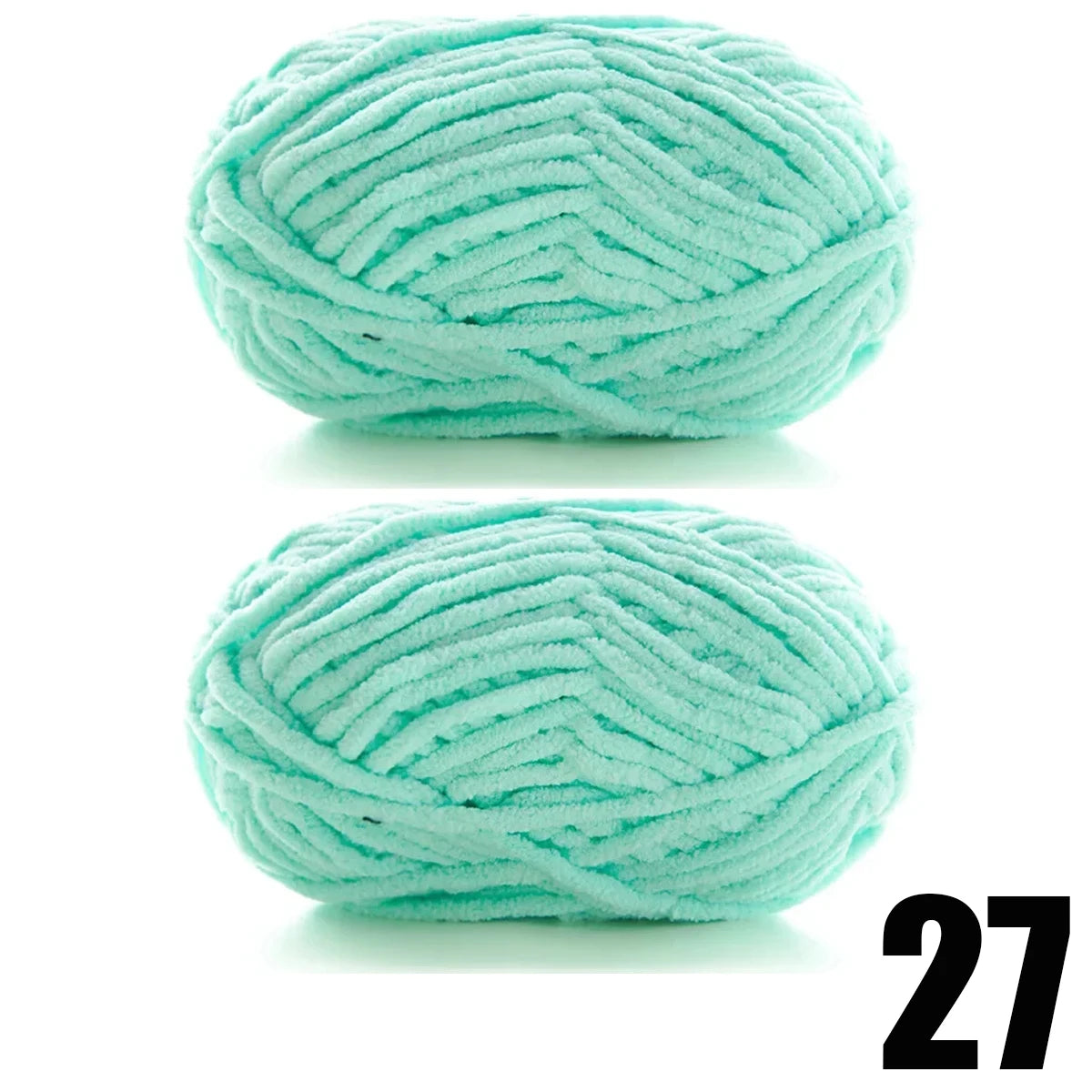 A ball of thick, light mint green velvet yarn for knitting and crochet projects.