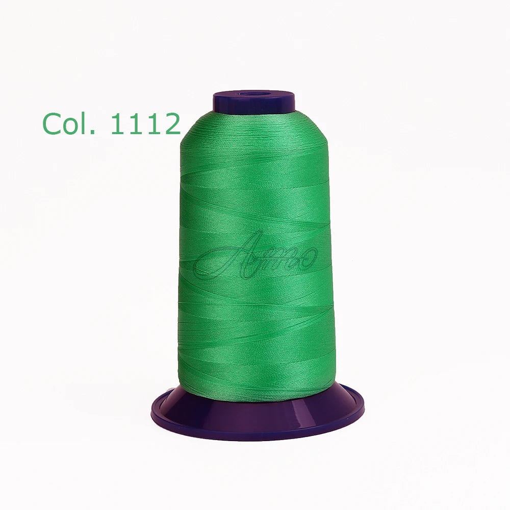 A spool of bright green high tenacity polyester embroidery thread labeled Col. 1112.