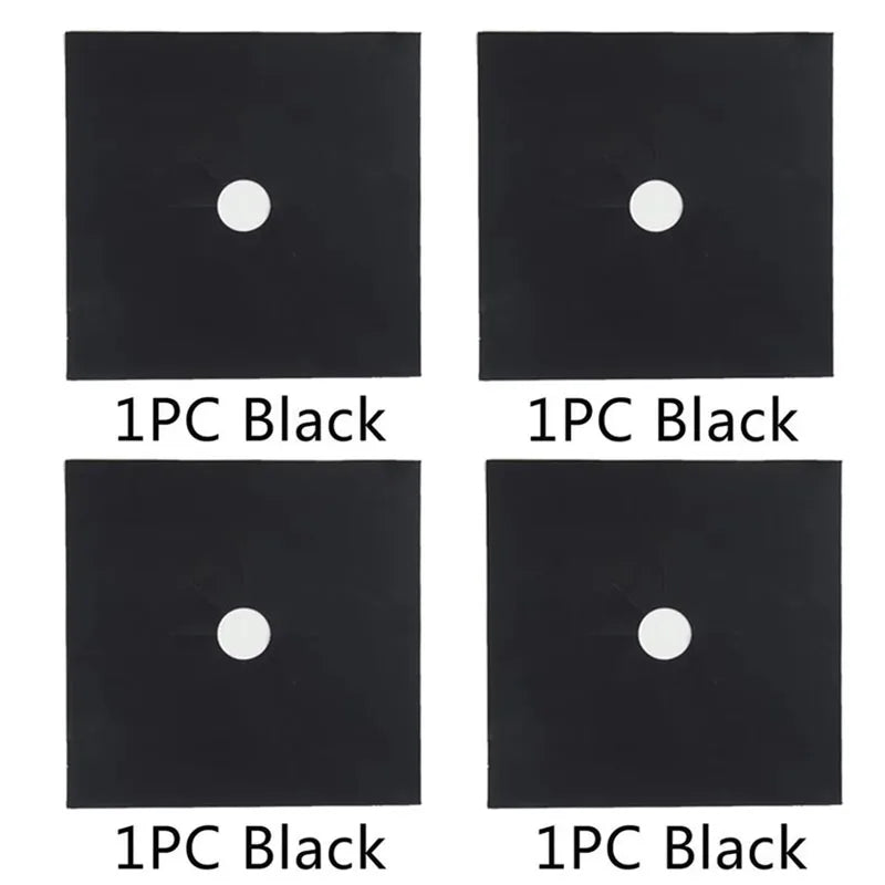 Four square black mats, each featuring a single white circular hole, used as stove burner protectors.