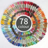 A circular display of 78 gradient cross stitch embroidery threads in various colors.