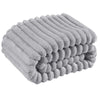 A stack of gray striped flannel throw blankets rolled up for cozy comfort
