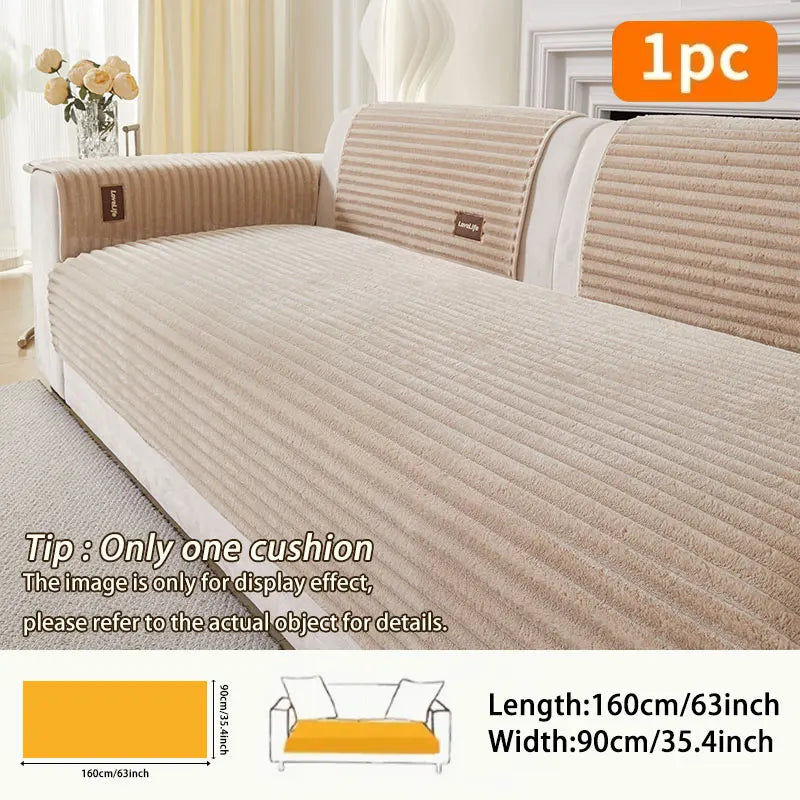 A beige minimalist anti-slip sofa cushion shown on a white sofa with matching striped throw pillows.