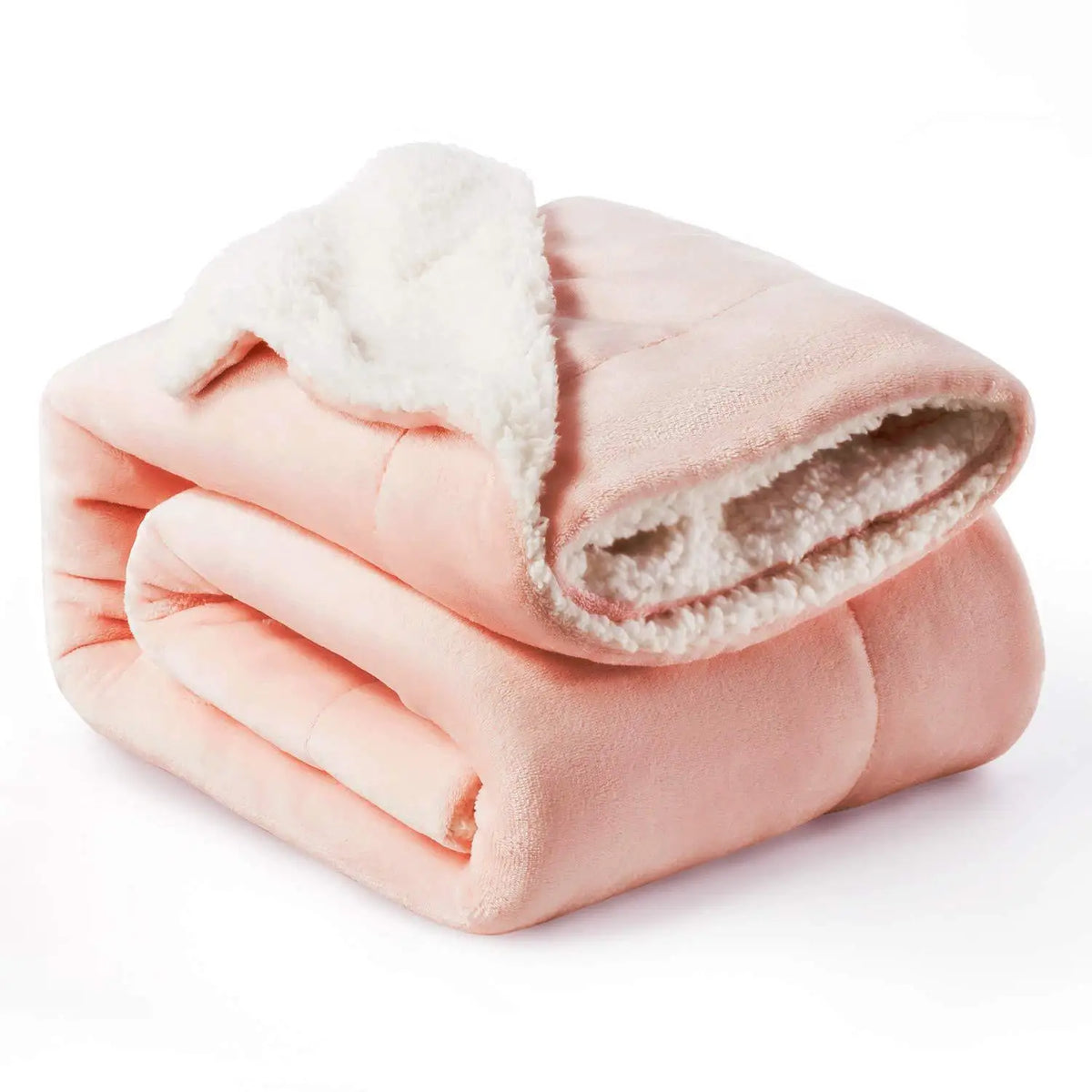 Pink sherpa fleece blanket rolled up, showing a fluffy white lining for winter warmth.