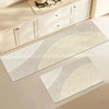 A rectangular kitchen floor mat with beige and white striped pattern placed on a light-colored countertop.