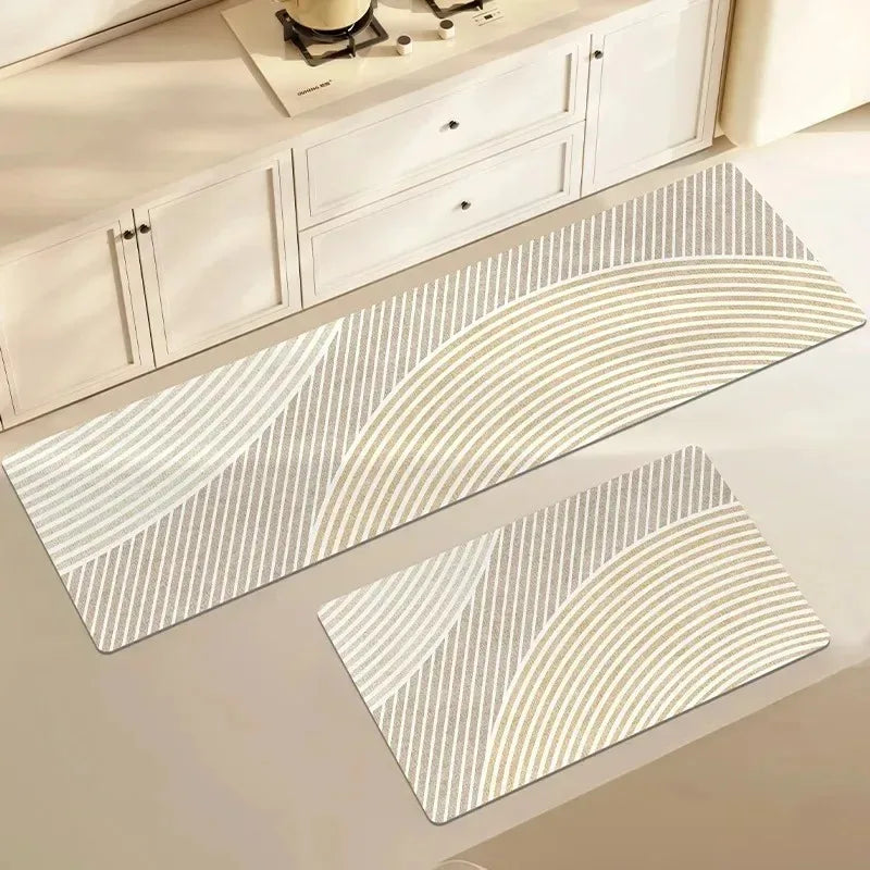 A rectangular kitchen floor mat with beige and white striped pattern placed on a light-colored countertop.