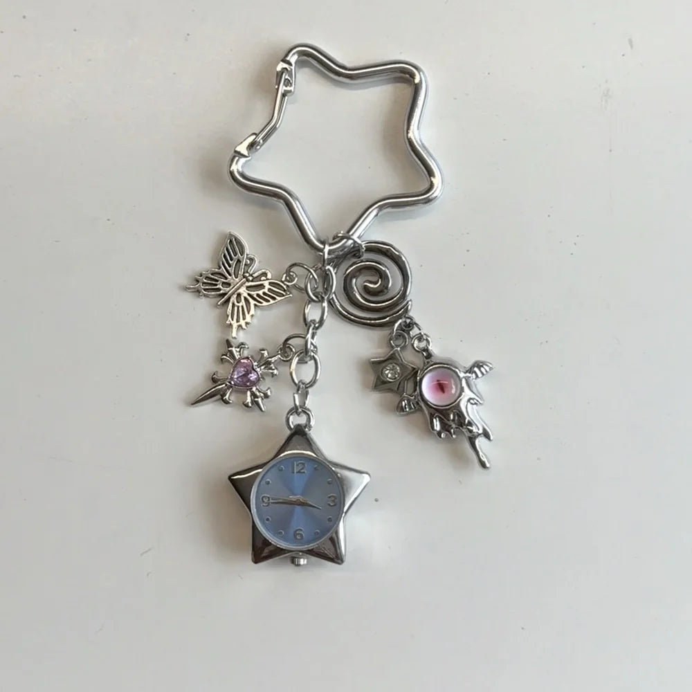 Silver star-shaped pocket watch keychain featuring an adjustable clock and a butterfly charm.