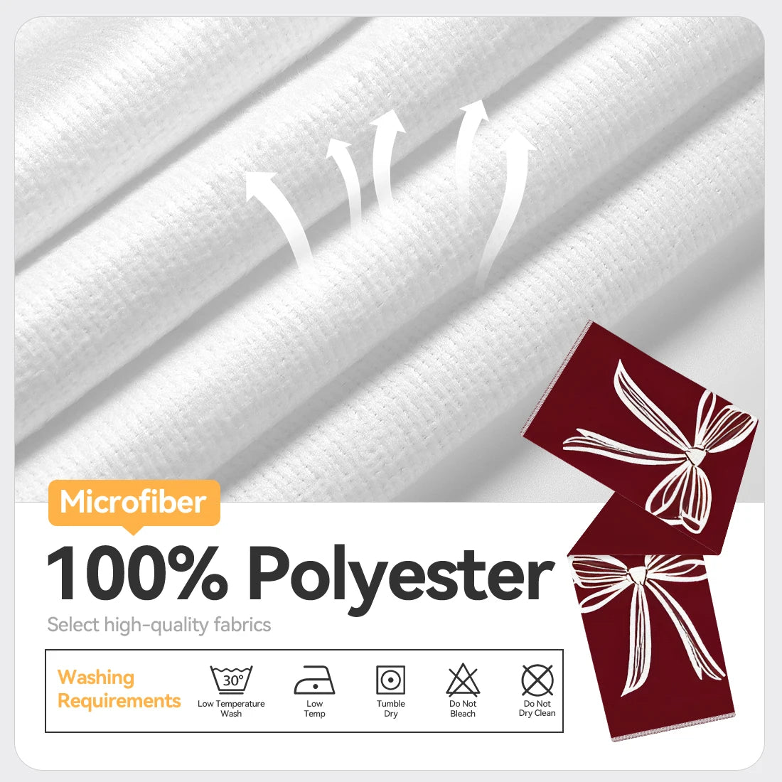 A set of two red microfiber polyester kitchen towels with decorative bows shown against a white background.