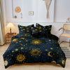 A dark blue duvet set featuring a sun and moon pattern with gold accents, displayed on a bed.