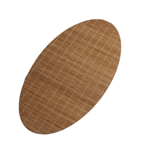 A round, brown bamboo tea mat with a fine vertical striped weave.