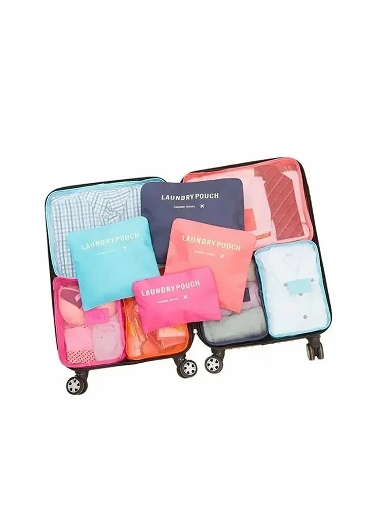 A set of six colorful laundry pouches in various shades of blue, pink, and purple displayed on a stand.