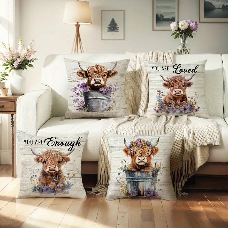 A set of decorative pillow covers featuring adorable Highland cow prints in earthy tones and purple flowers.