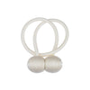 Two white magnetic curtain tiebacks with looped cords and spherical ends