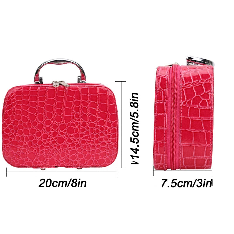 A bright pink crocodile-patterned zippered pouch with a metal handle and zipper.