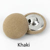 A set of round fabric-covered shank buttons in khaki color.