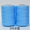 Two spools of bright blue hand knitting and crochet cord for crafting