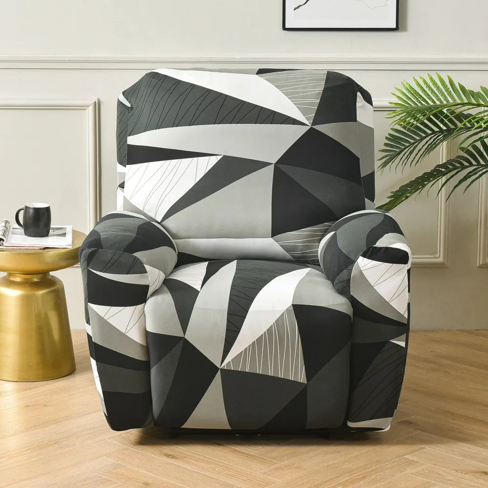 A modern armchair upholstered in a geometric black and white pattern sits on a wooden floor.