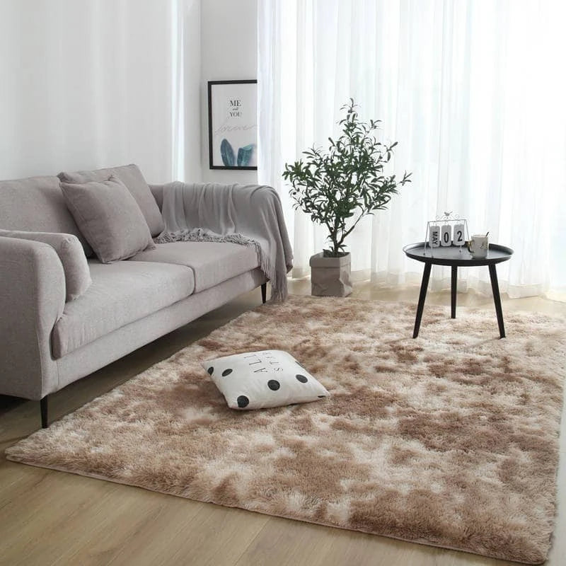 A fluffy brown luxury velvet anti-slip floor mat placed on a light wood floor near a window.