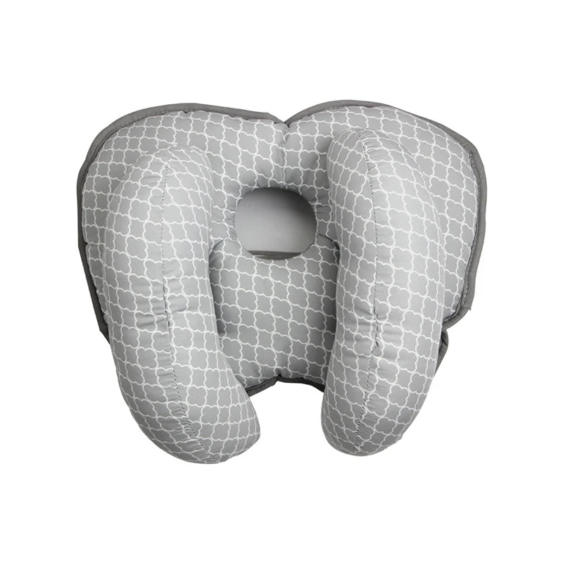 Gray baby head and neck support pillow designed for use in strollers and car seats