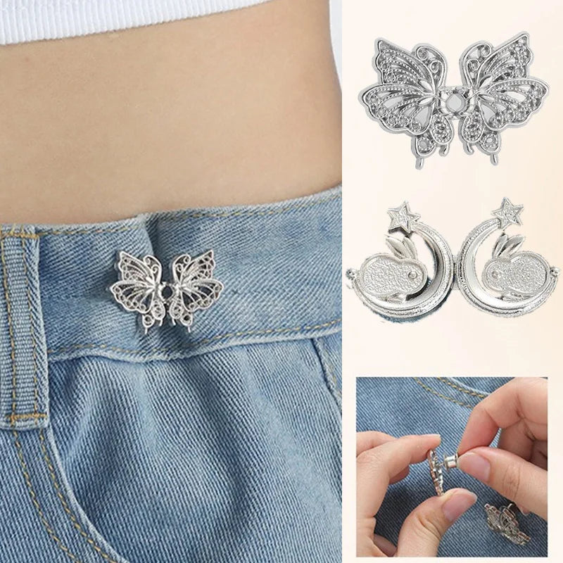 Silver butterfly button clips used to fasten denim clothing or for sewing