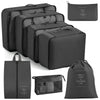 A set of black travel storage organizers including a zippered pouch and a large storage box.
