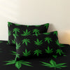 Black fitted sheet with a green cannabis leaf print
