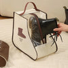 A beige waterproof foldable storage bag with a black leather boot inside, held by a hand.
