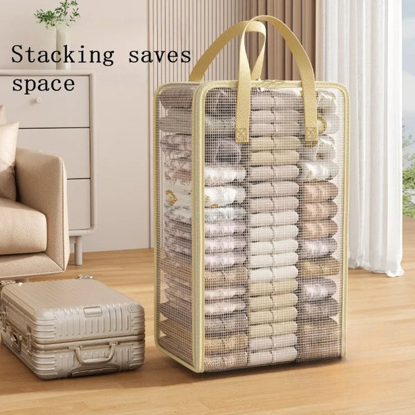 A transparent mesh storage bag with handles filled with neatly stacked textiles, used for saving space.