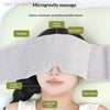 A person is receiving a microgravity massage treatment on their face and ears using specialized glasses and acupoints.