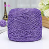 Purple metallic silk crocheting and knitting yarn in a ball