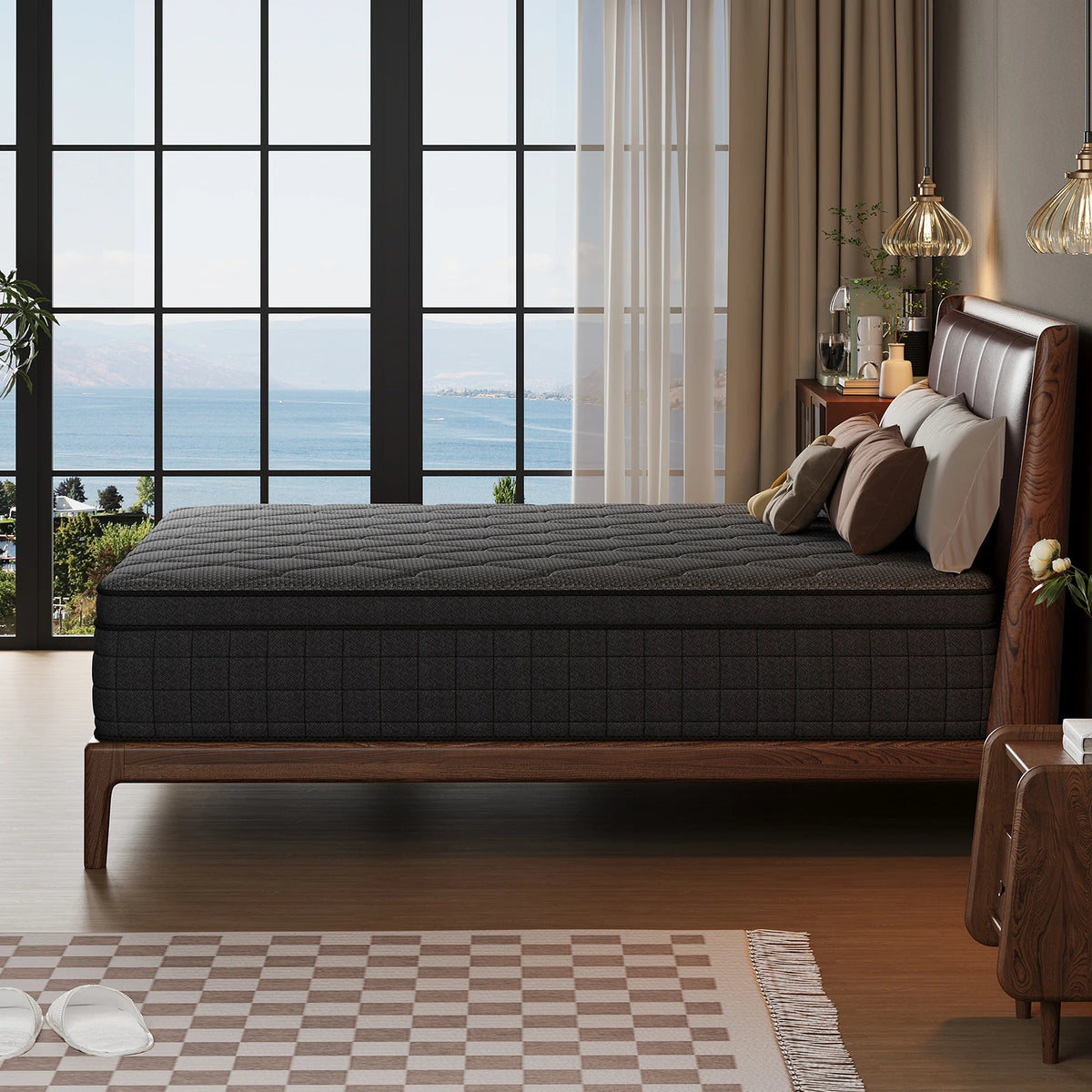 A dark gray hybrid memory foam and pocket spring mattress resting on a wooden bed frame in a modern bedroom.