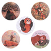 A set of tinplate pin brooches featuring animals and music themes, including a bear, an orangutan, and a monkey.