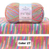 A ball of multi-colored yarn with pink, green, and orange hues displayed on a knitted fabric background.