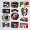A collection of tactical patches and flags featuring Mexican symbols including the flag, eagle, skull, and various national e