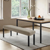 A light beige stretch jacquard dining bench cover placed on a wooden floor in a bright room.