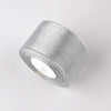 Roll of silver glitter organza ribbon for gift wrapping and DIY crafts