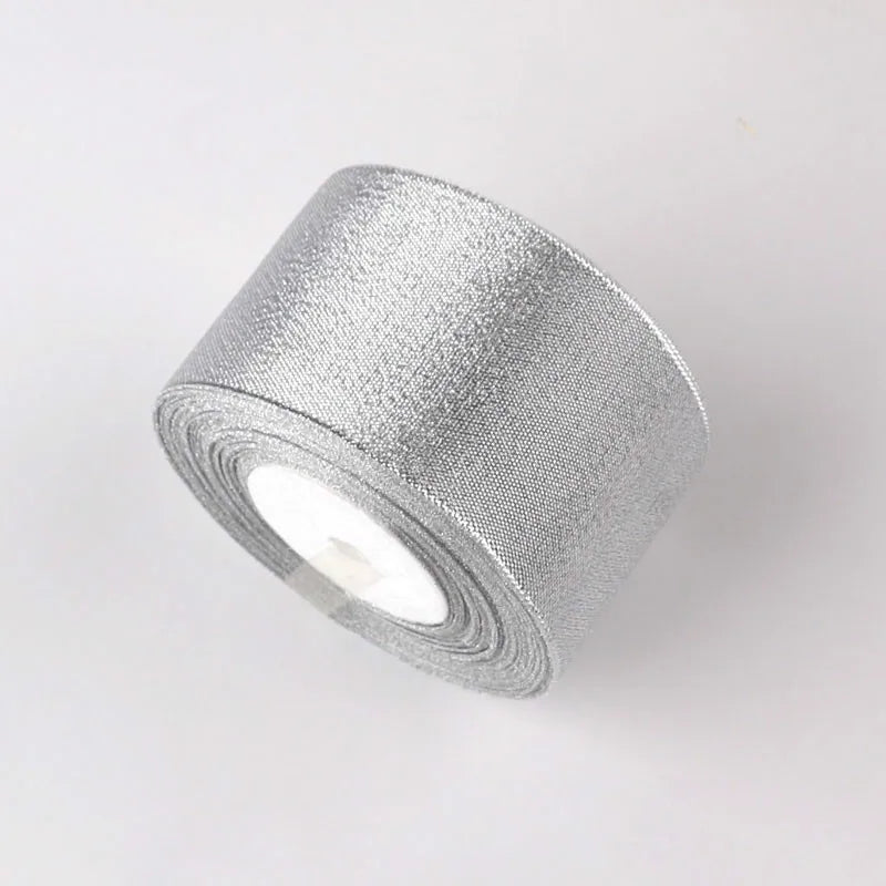 Roll of silver glitter organza ribbon for gift wrapping and DIY crafts