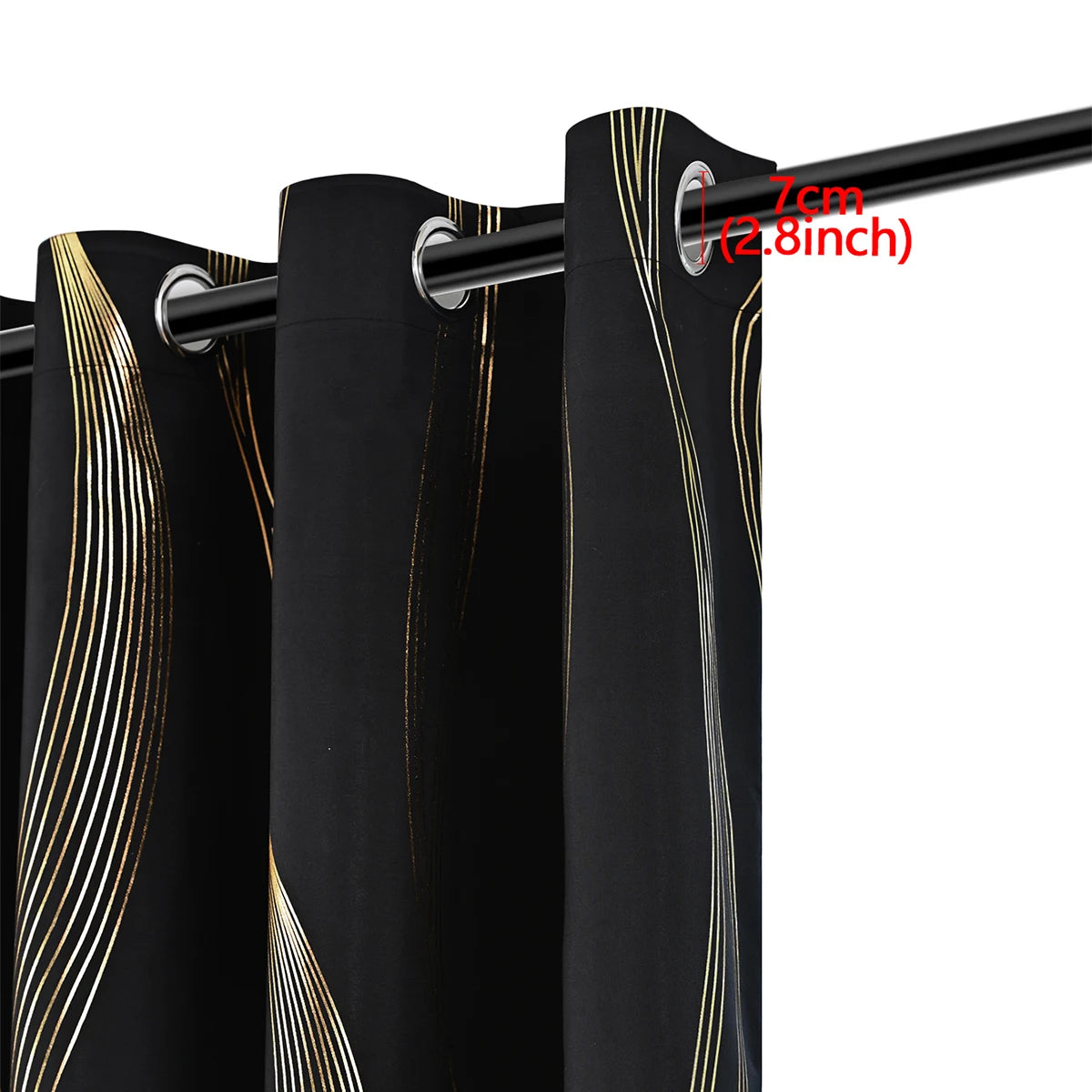 Two black blackout curtains with a golden wave pattern hanging from a rod.