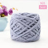 A ball of gray felted knitting yarn labeled N21 Soot for home decor