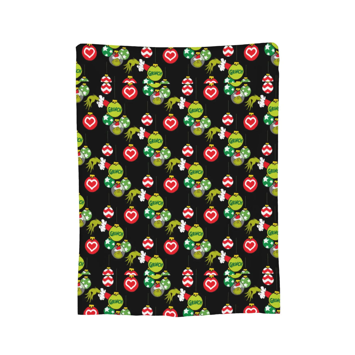 A dark background blanket featuring a repeating pattern of red and green Christmas ornaments.